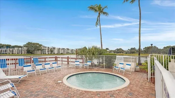 a view of a lake with a terrace