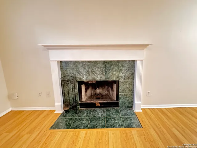a living room with a fireplace