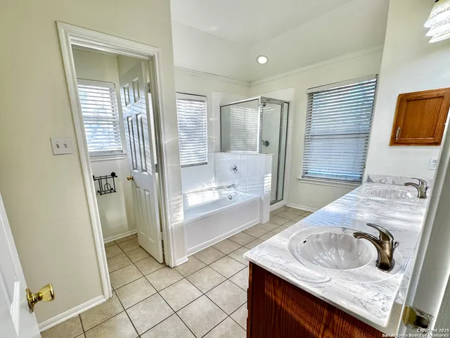 a bathroom with a toilet and a shower curtain