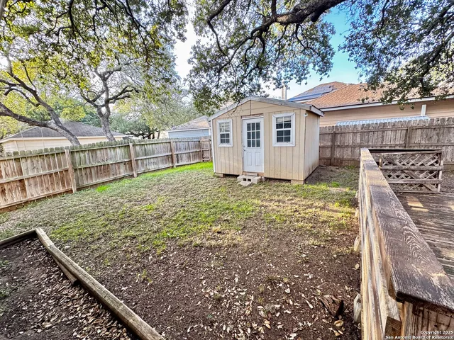 a house view with a backyard