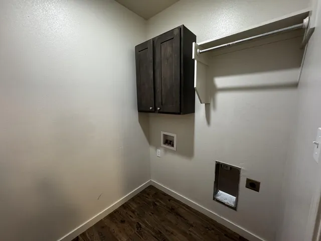 a view of a livingroom with a ceiling fan and window