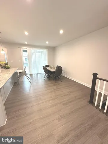 a workspace with furniture and wooden floor