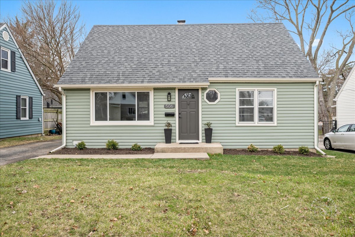 506 North Garfield Street Lombard, IL 60148 - Photo 1 of 40 a house with trees in front of it