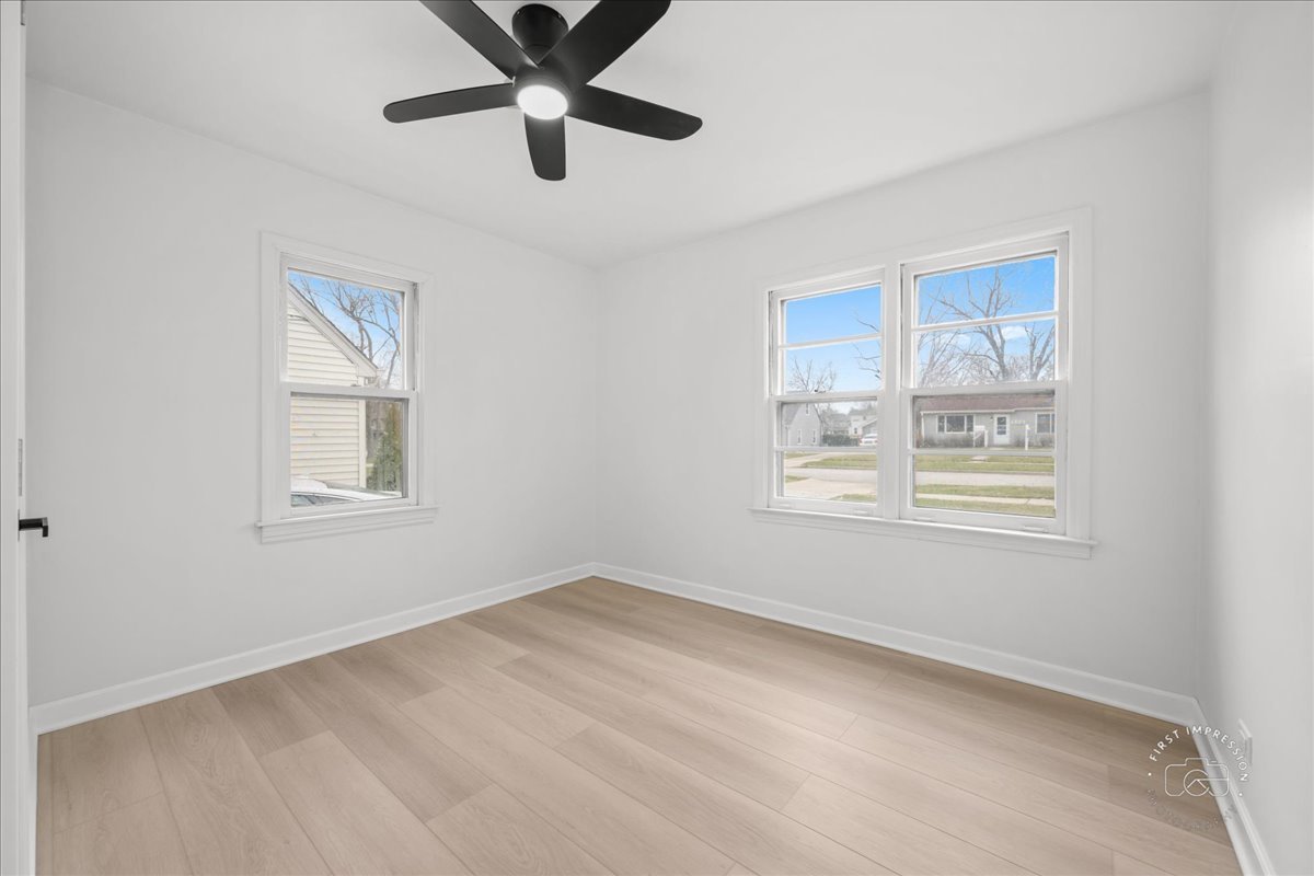 506 North Garfield Street Lombard, IL 60148 - Photo 14 of 40 a view of an empty room with a window