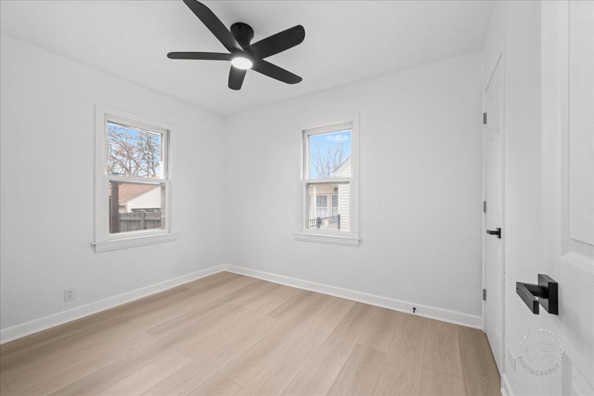 506 North Garfield Street Lombard, IL 60148 - Photo 16 of 40 a view of empty room with wooden floor