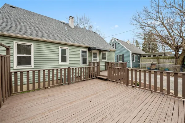a view of a wooden roof deck