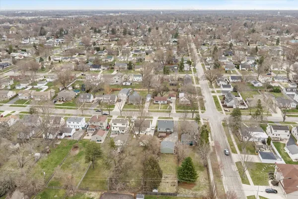 an aerial view of residential house with parking space