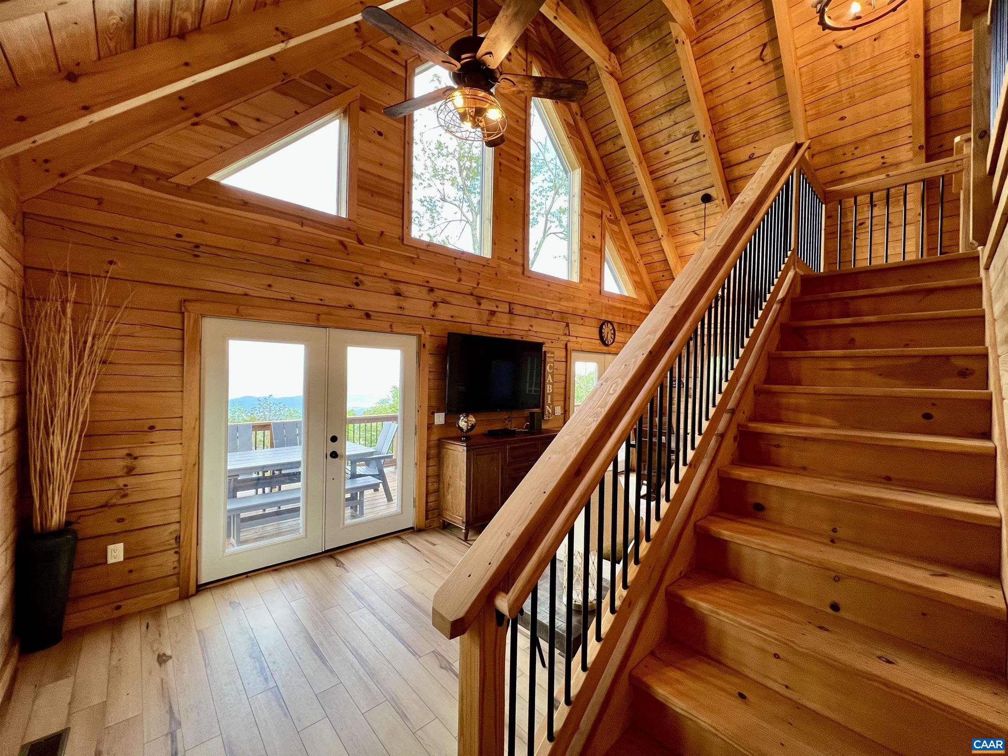 248 Raven Way Free Union, VA 22940 - Photo 24 of 47 a view of an entryway with wooden floor and stairs