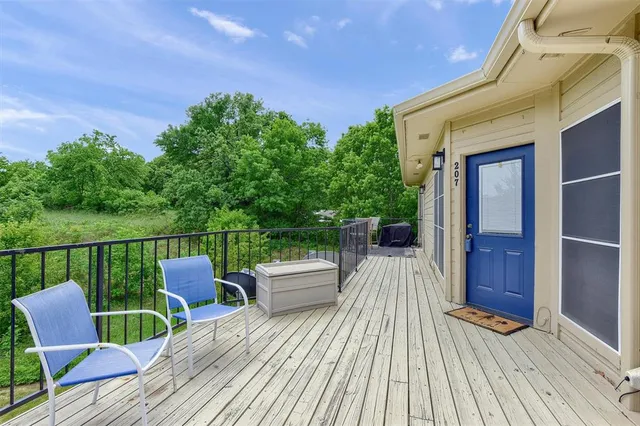 a view of roof deck with patio