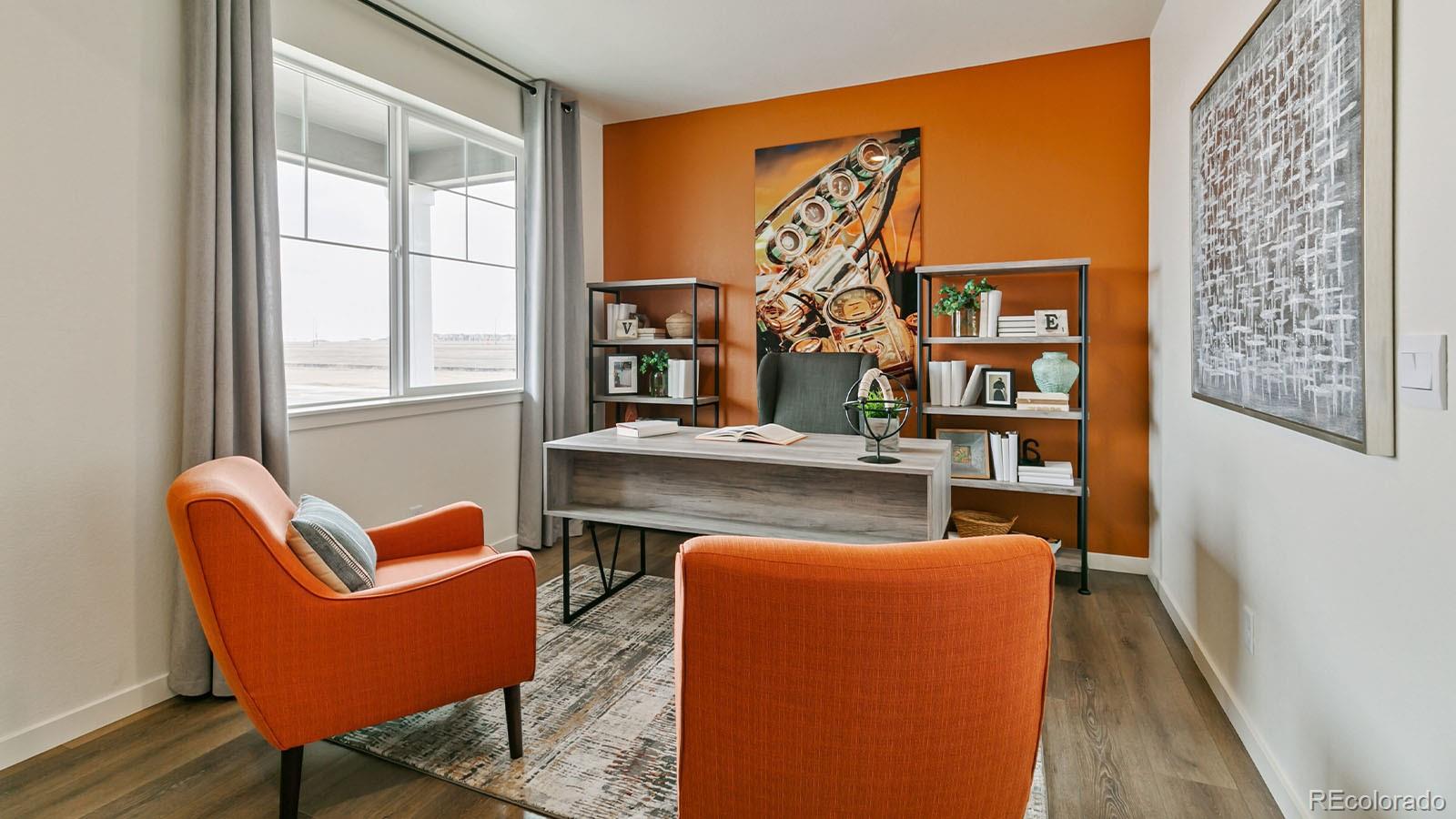 801 South Apex Avenue Fort Lupton, CO 80621 - Photo 2 of 26 a room with furniture and a window