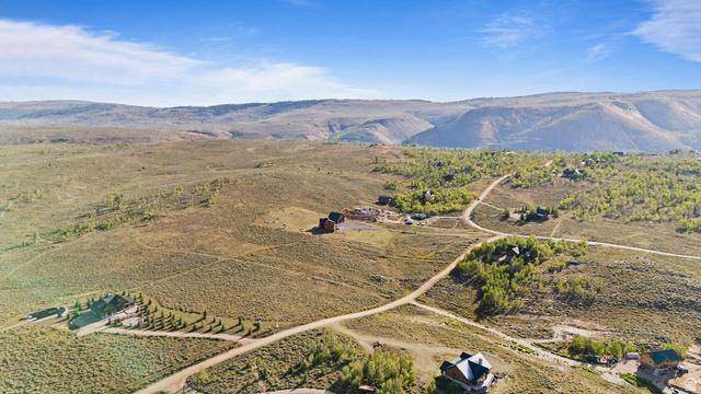 61 Skyline, Unit 61 Helper, UT 84526 - Photo 25 of 31 Expansive mountain landscape with scattered residential structures and unpaved roads
