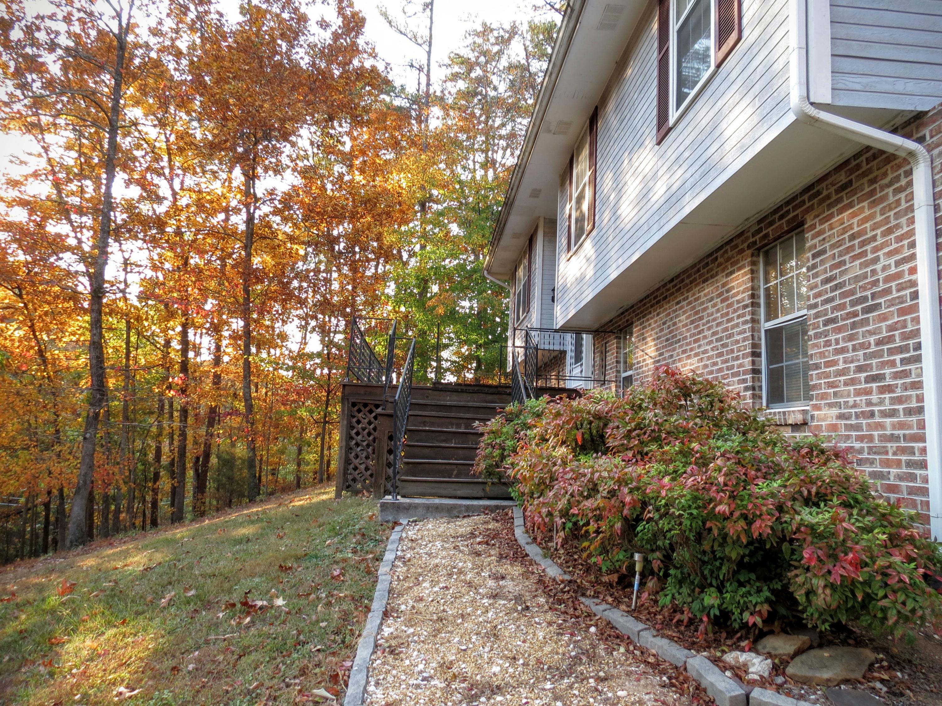 755 Green Pond Road Soddy Daisy, TN 37379 - Photo 3 of 33 Front Pebble Sidewalk