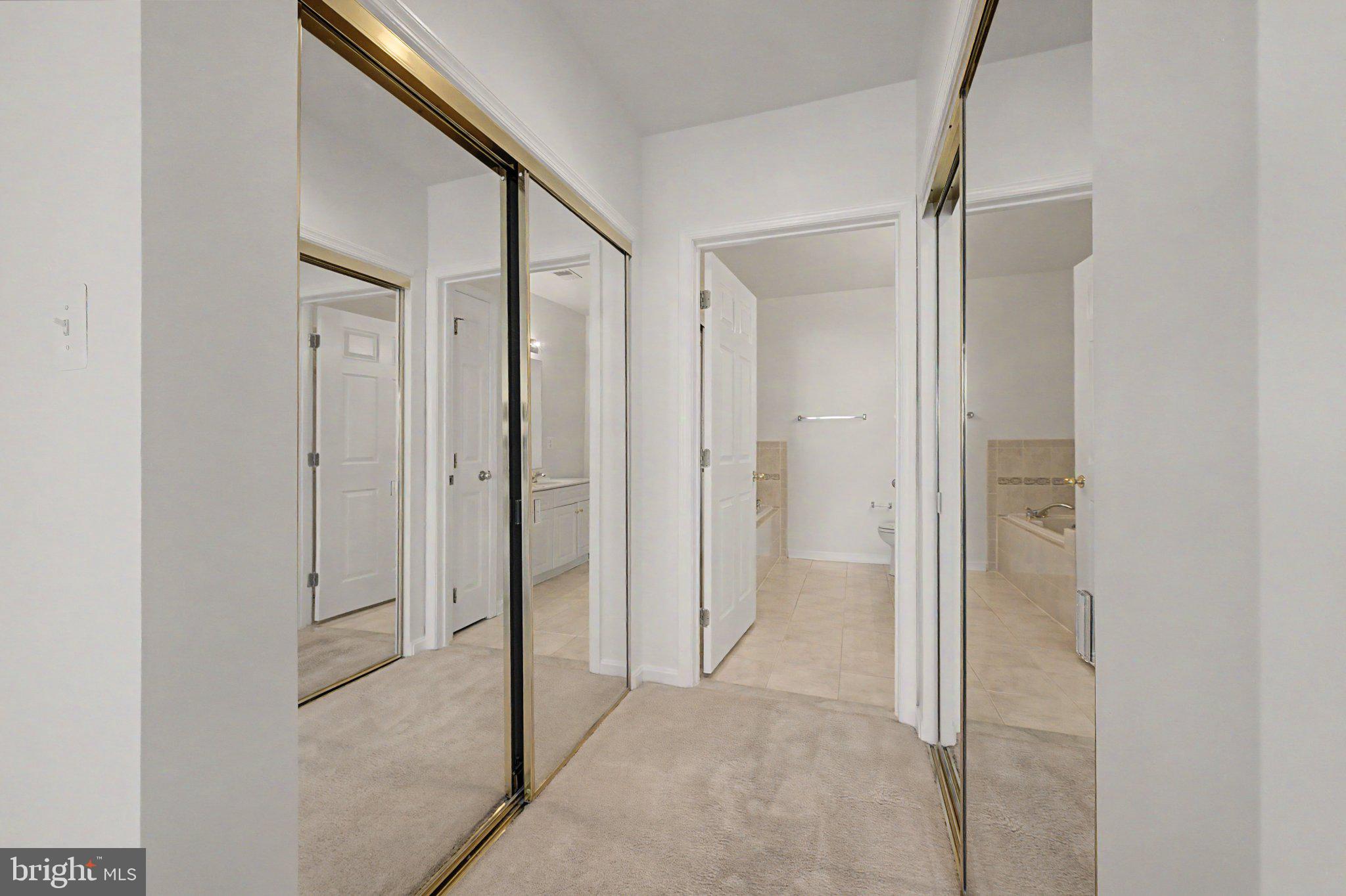 25252 Riffleford Square, Unit 204 Chantilly, VA 20152 - Photo 24 of 28 Primary Dual Closets