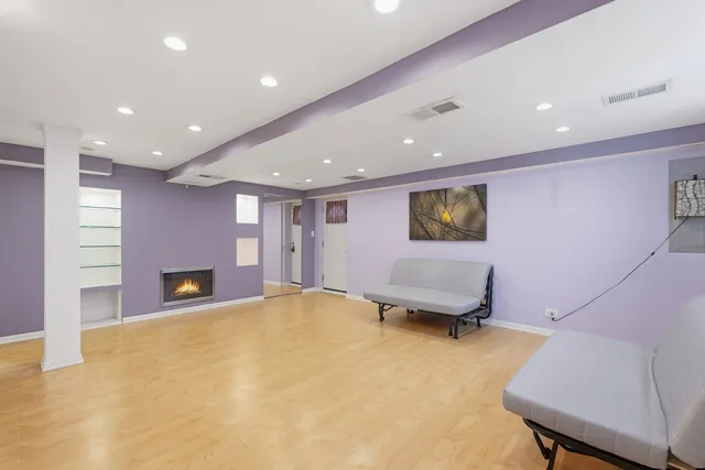 a bedroom with a bed and a desk