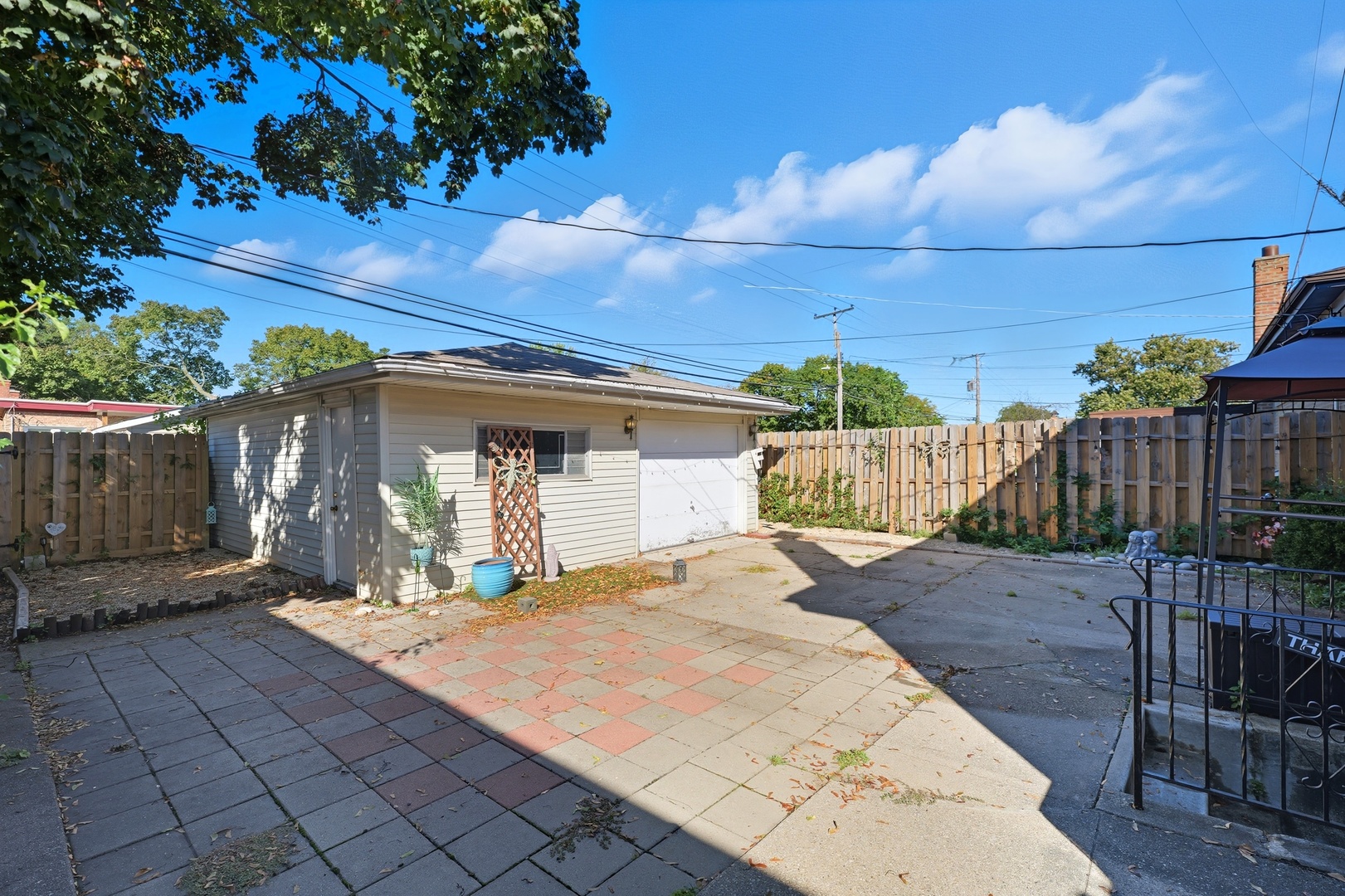 9020 South Constance Avenue Chicago, IL 60617 - Photo 17 of 26 a view of a backyard with sitting area