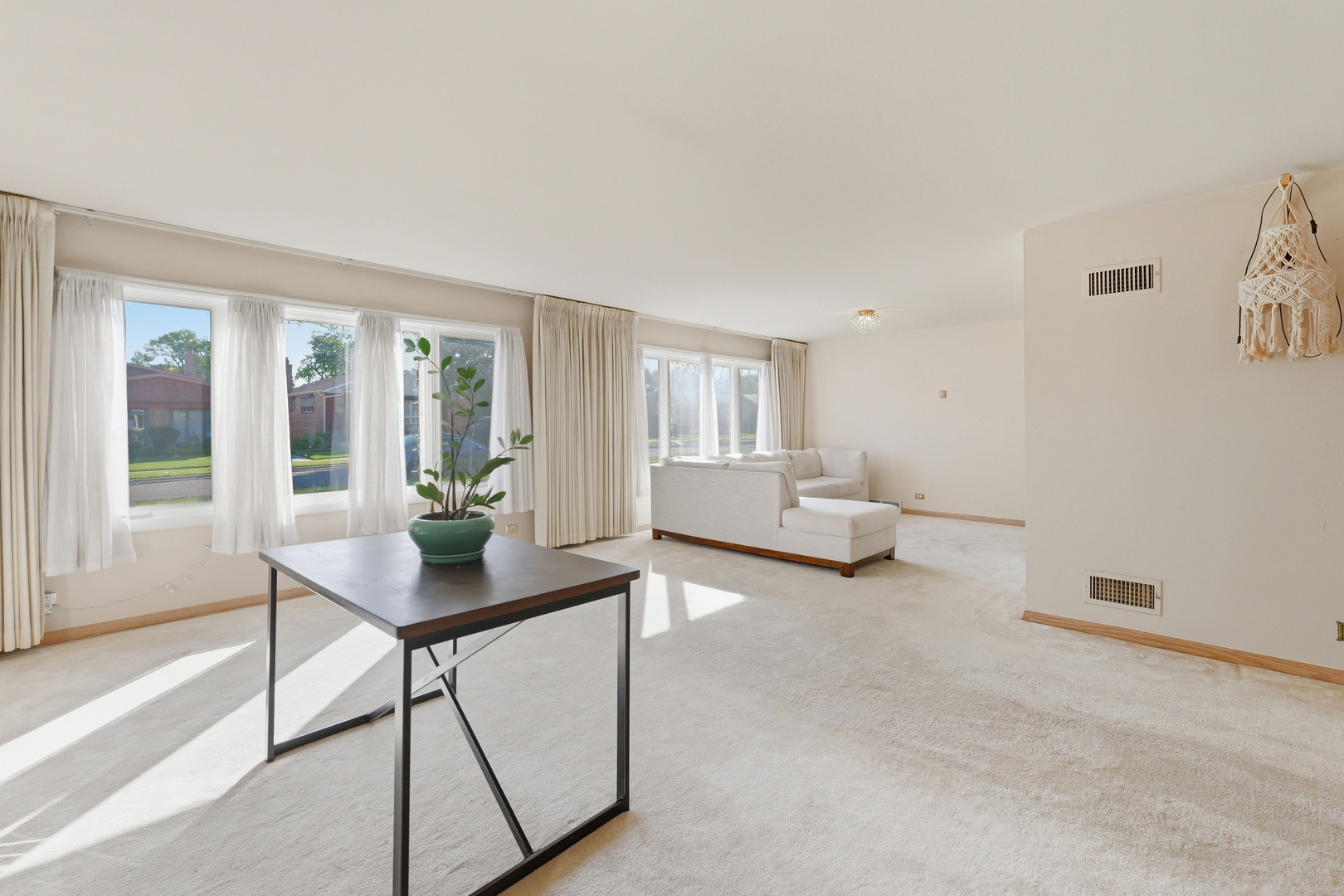 9020 South Constance Avenue Chicago, IL 60617 - Photo 2 of 26 a living room with furniture and a window
