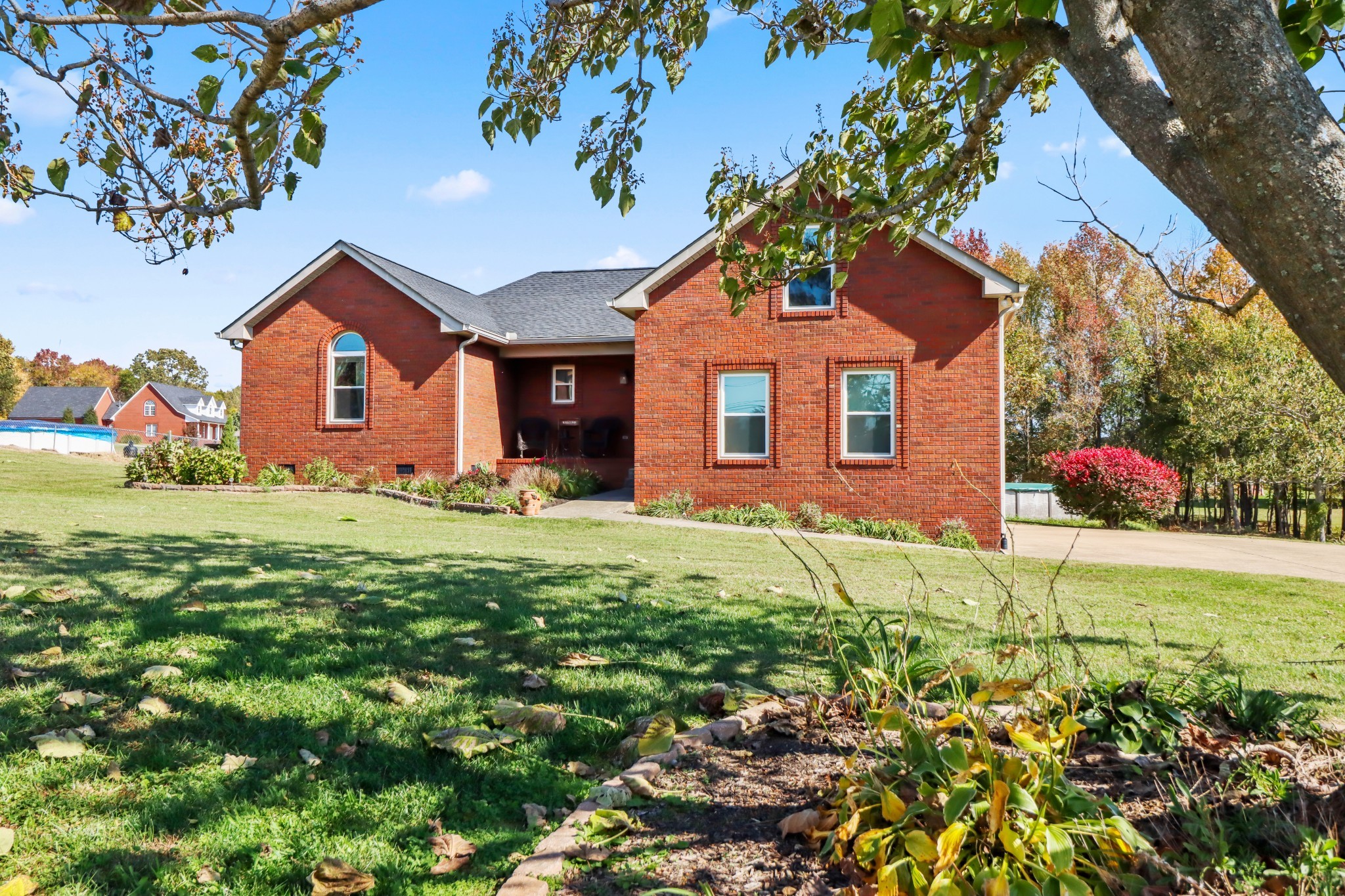 4591 Washington Road Greenbrier, TN 37073 - Photo 1 of 14 front view of a house with a yard