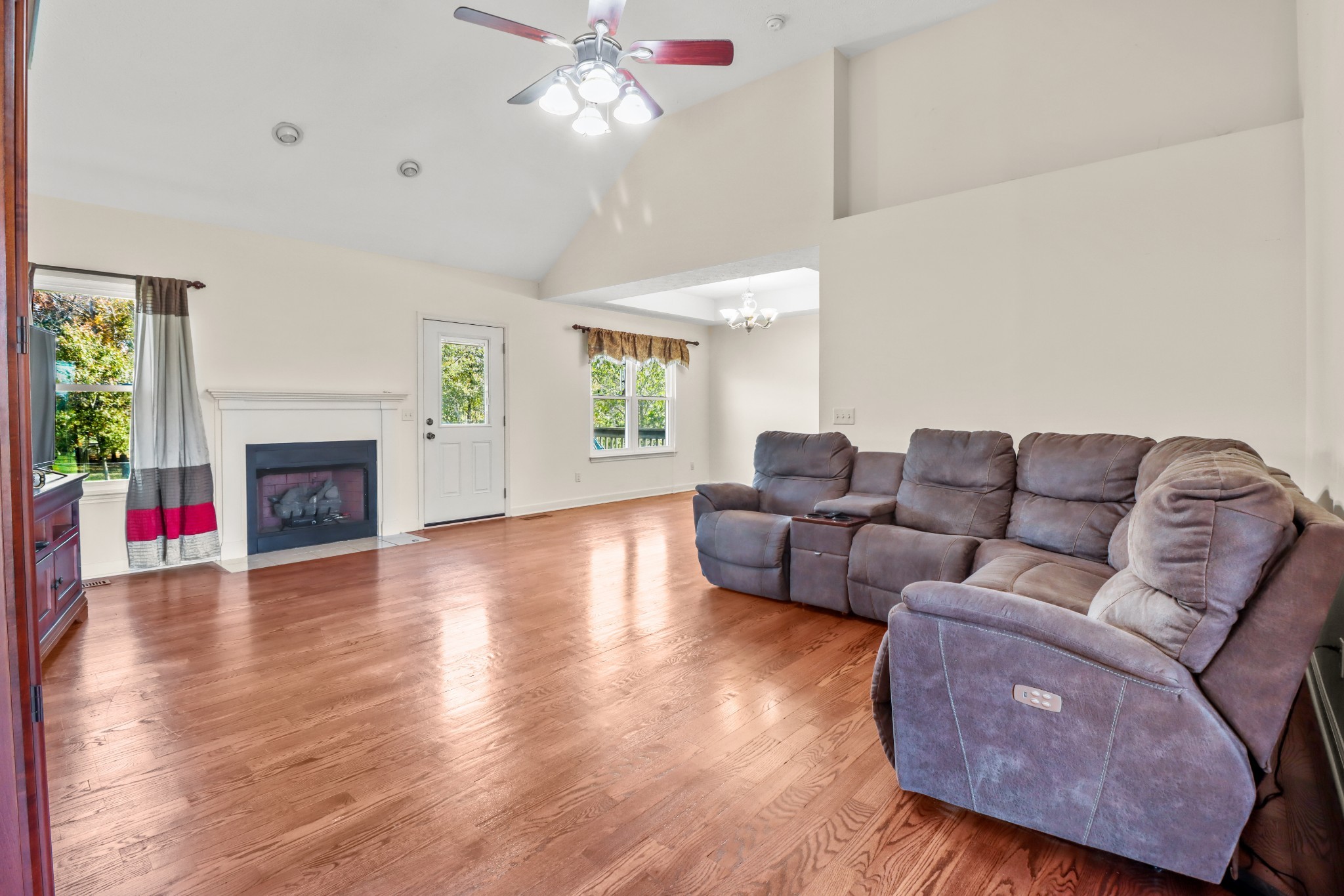 4591 Washington Road Greenbrier, TN 37073 - Photo 10 of 14 a living room with furniture and a fireplace