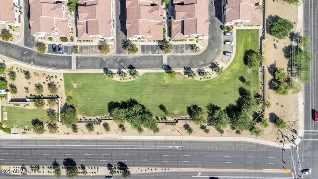 a view of a golf course with a lake view