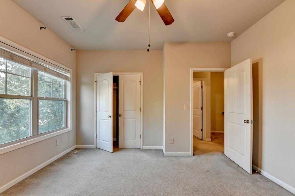 5166 Apple Grove Road Northeast Buford, GA 30519 - Photo 19 of 29 a view of empty room with window