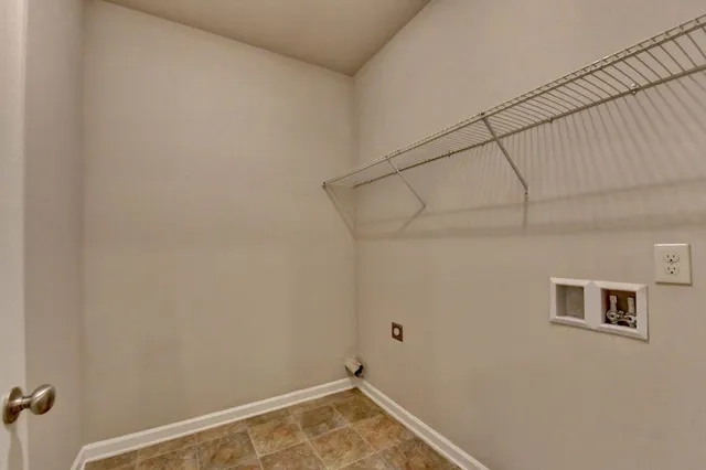 a view of a room with rack on the wall