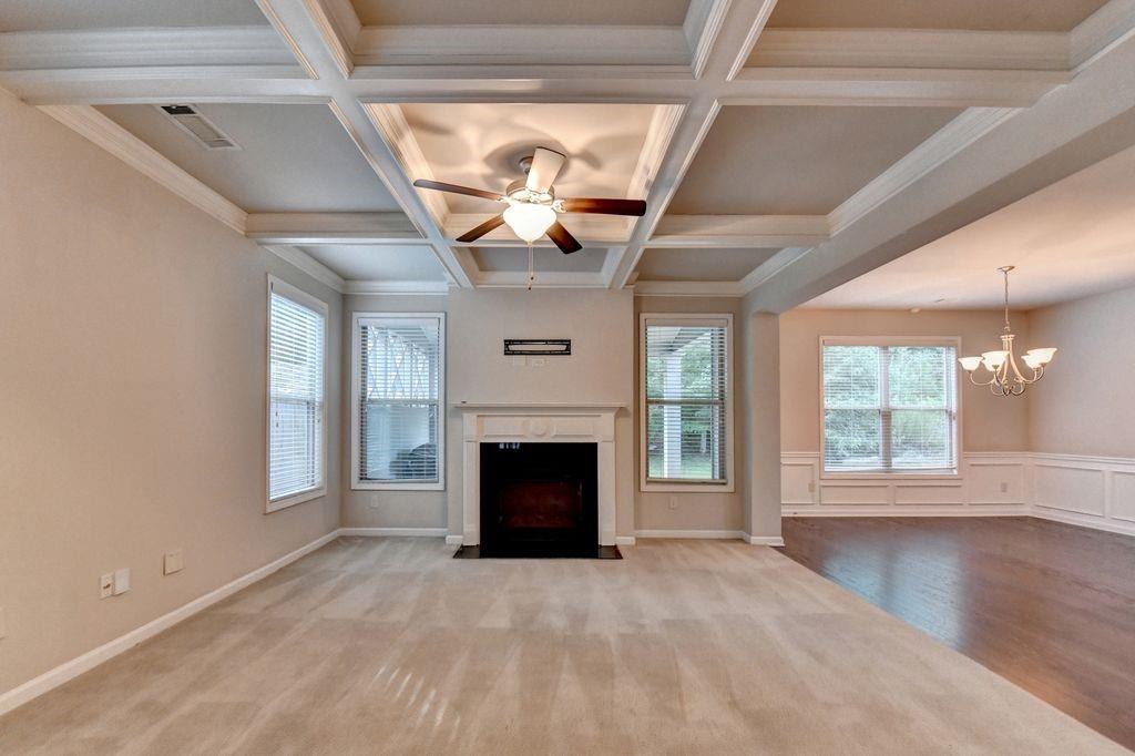 5166 Apple Grove Road Northeast Buford, GA 30519 - Photo 5 of 29 a view of a livingroom with a fireplace and window