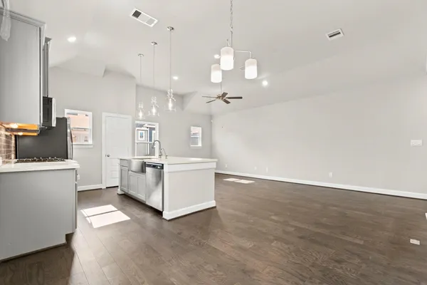 a view of a kitchen with electric appliances
