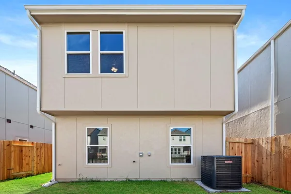 a view of building with yard