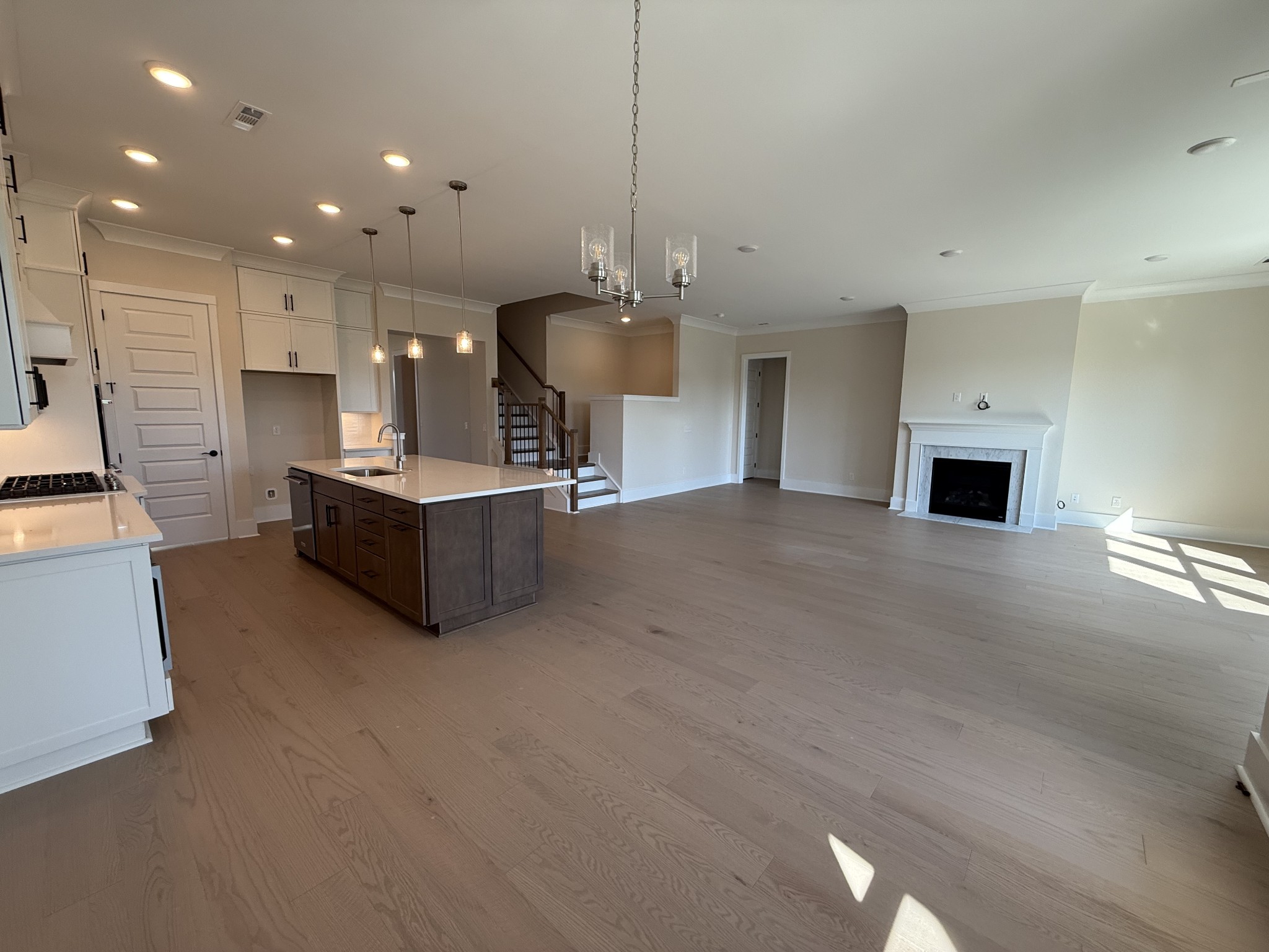 7744 Second Fiddle Way Arrington, TN 37014 - Photo 13 of 31 a large room with kitchen view and a fireplace