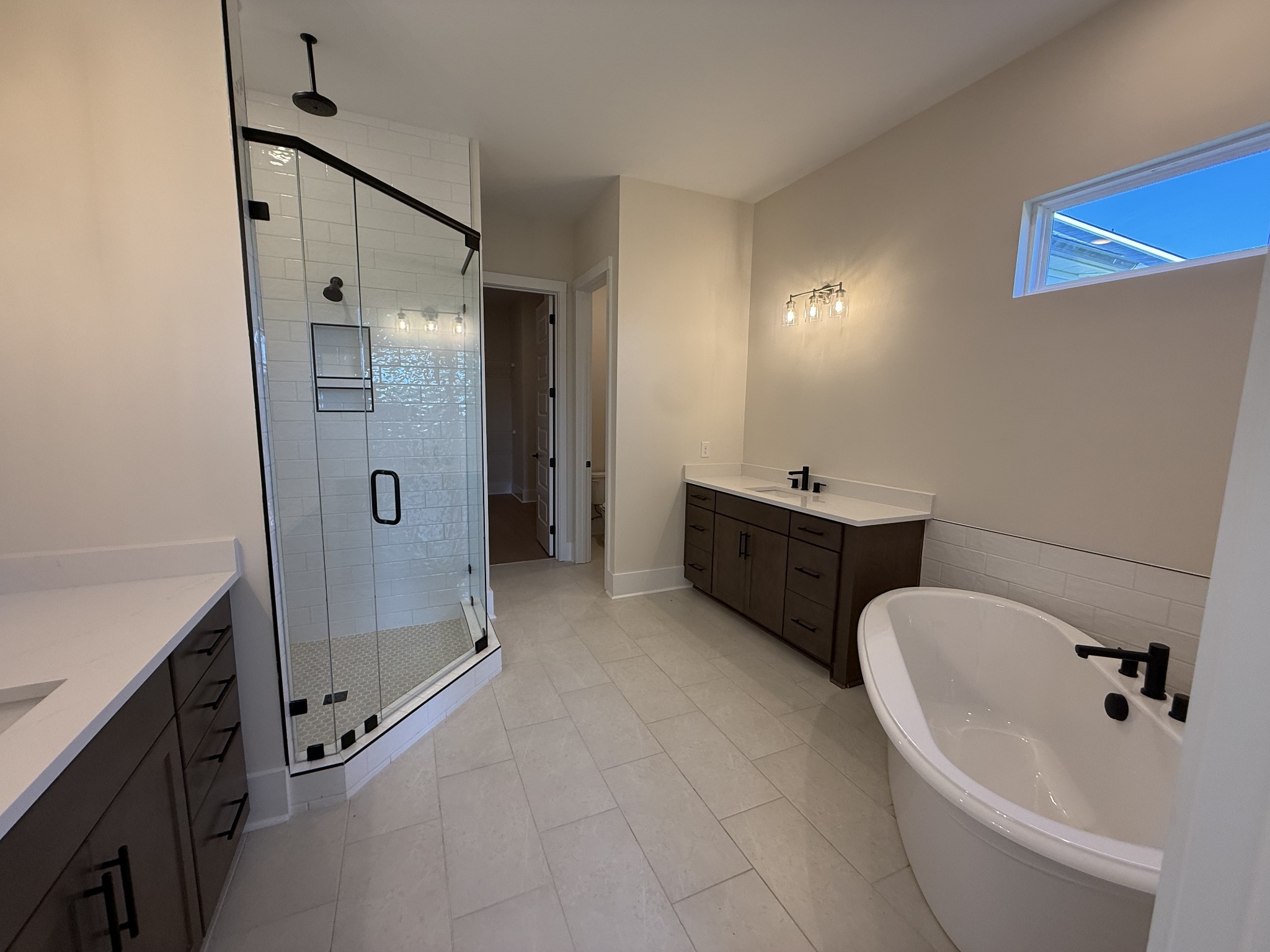 7744 Second Fiddle Way Arrington, TN 37014 - Photo 19 of 31 a bathroom with a tub sink toilet and shower