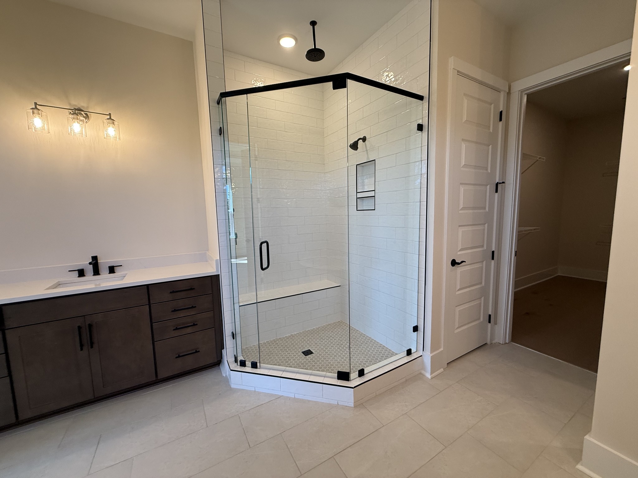 7744 Second Fiddle Way Arrington, TN 37014 - Photo 21 of 31 a bathroom with a mirror and a shower