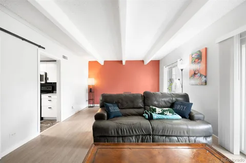 a living room with furniture and a couch