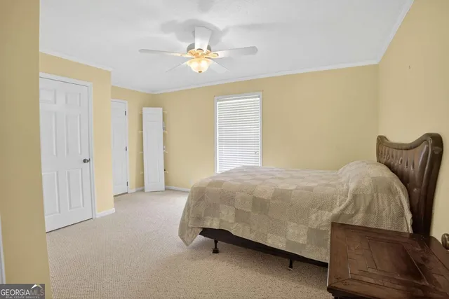a view of work space with window and wooden floor
