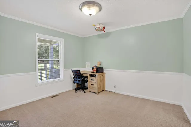 a kitchen with stainless steel appliances granite countertop a refrigerator sink and stove