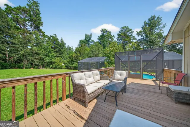a view of a chairs on the roof deck