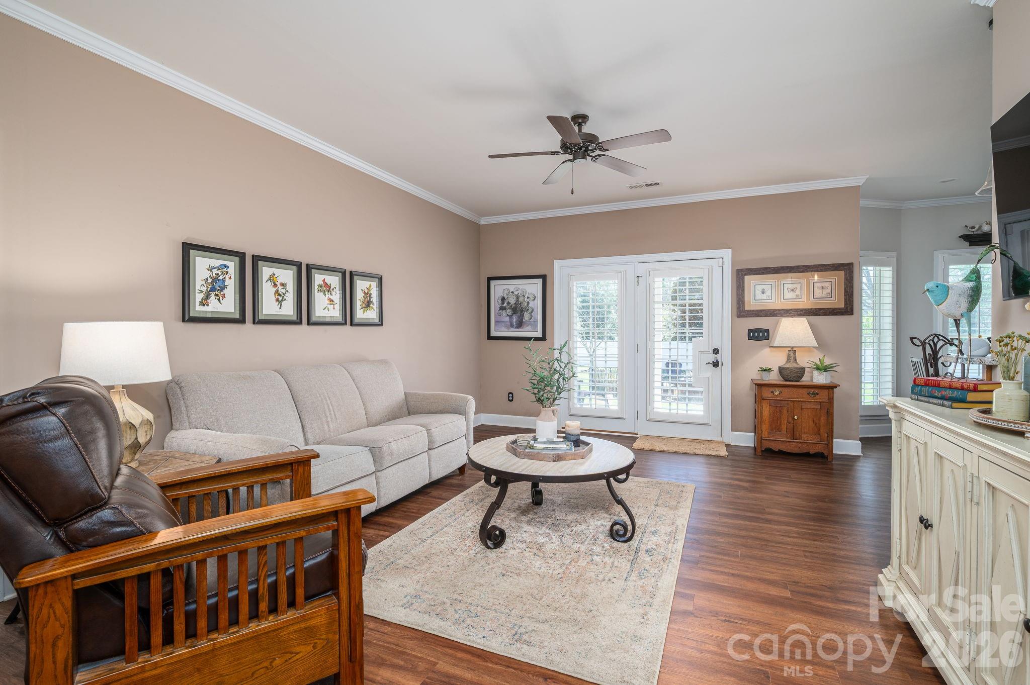 140 Huffstetler Lake Road Dallas, NC 28034 - Photo 6 of 22 a living room with furniture and a wooden floor