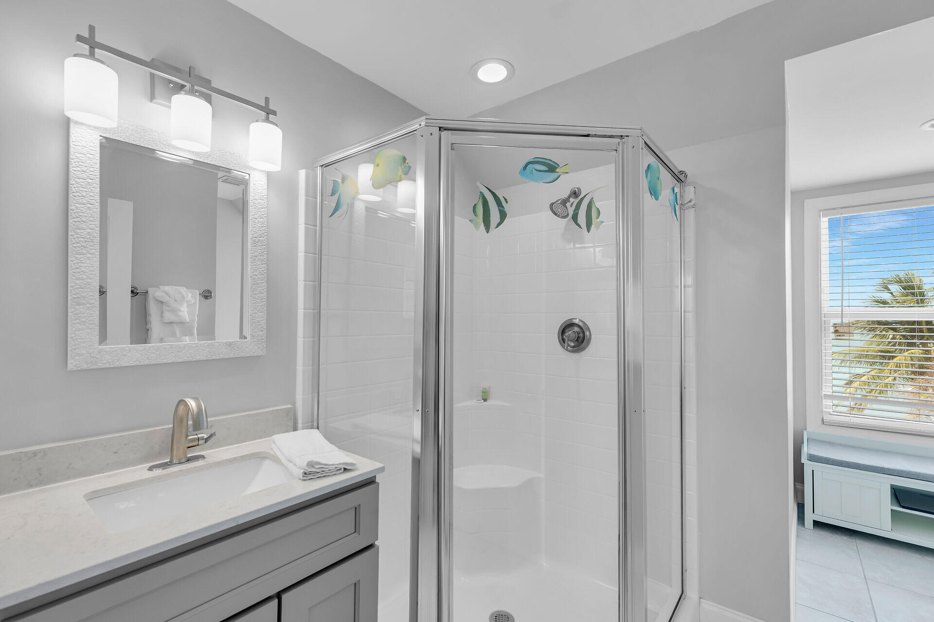412 122nd Street Marathon, FL 33050 - Photo 20 of 43 a bathroom with a shower sink and mirror