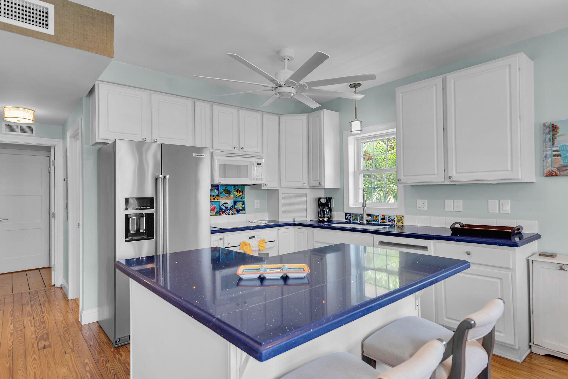 412 122nd Street Marathon, FL 33050 - Photo 6 of 43 a kitchen with stainless steel appliances granite countertop a sink a stove and a refrigerator