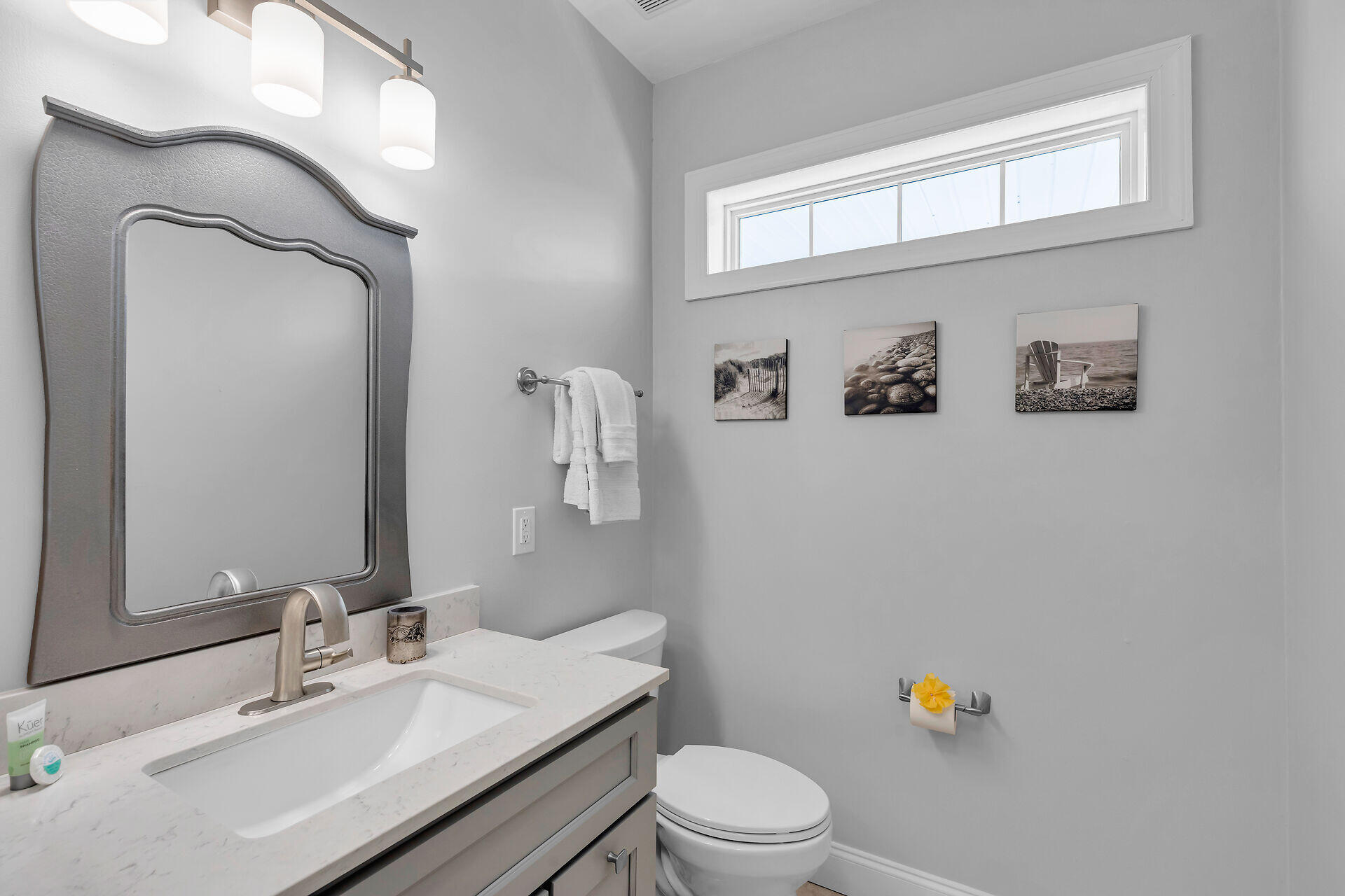 412 122nd Street Marathon, FL 33050 - Photo 9 of 43 a bathroom with a sink a toilet and mirror