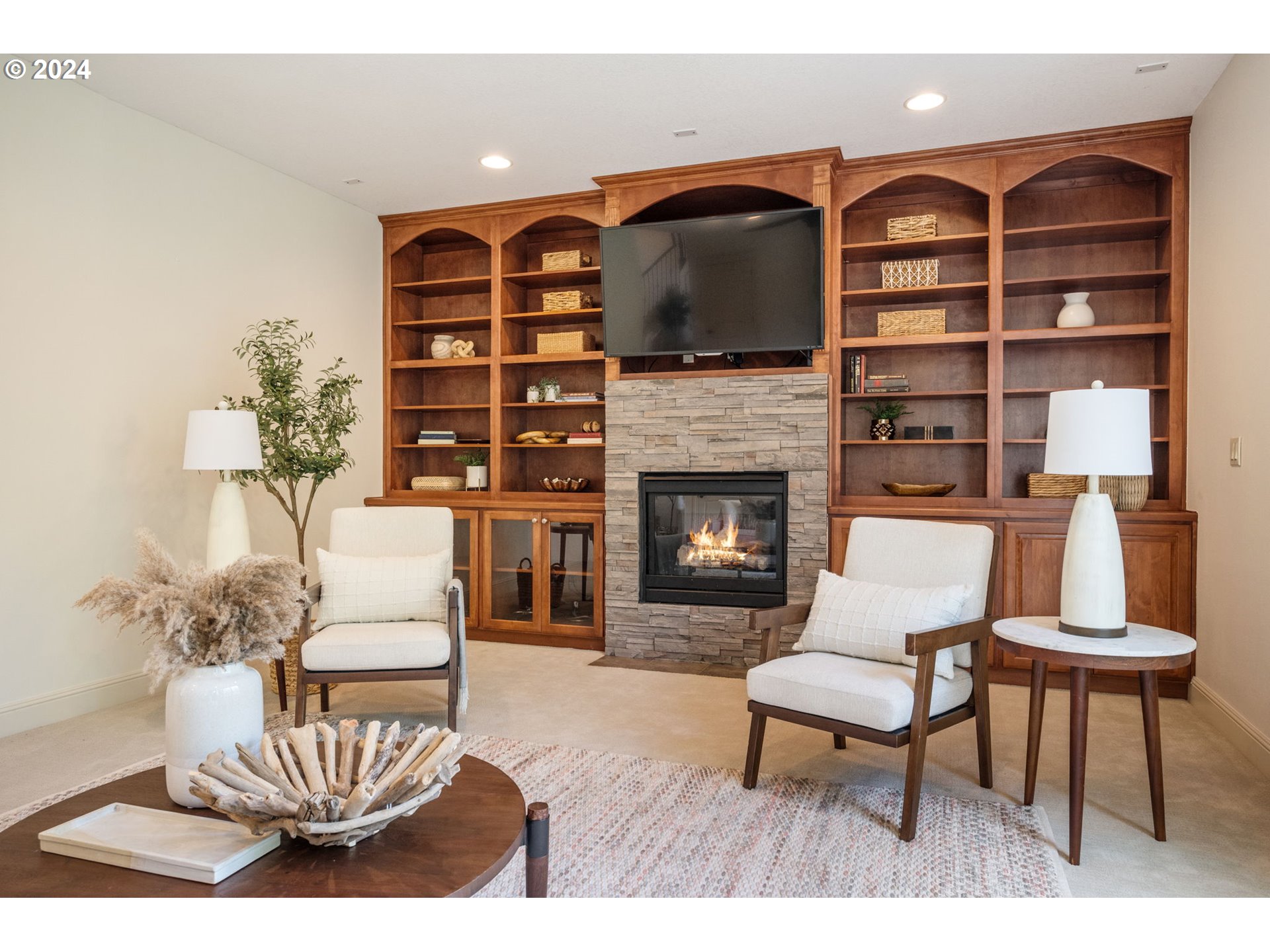 2204 South 17th Way Ridgefield, WA 98642 - Photo 12 of 45 a living room with furniture and a fireplace