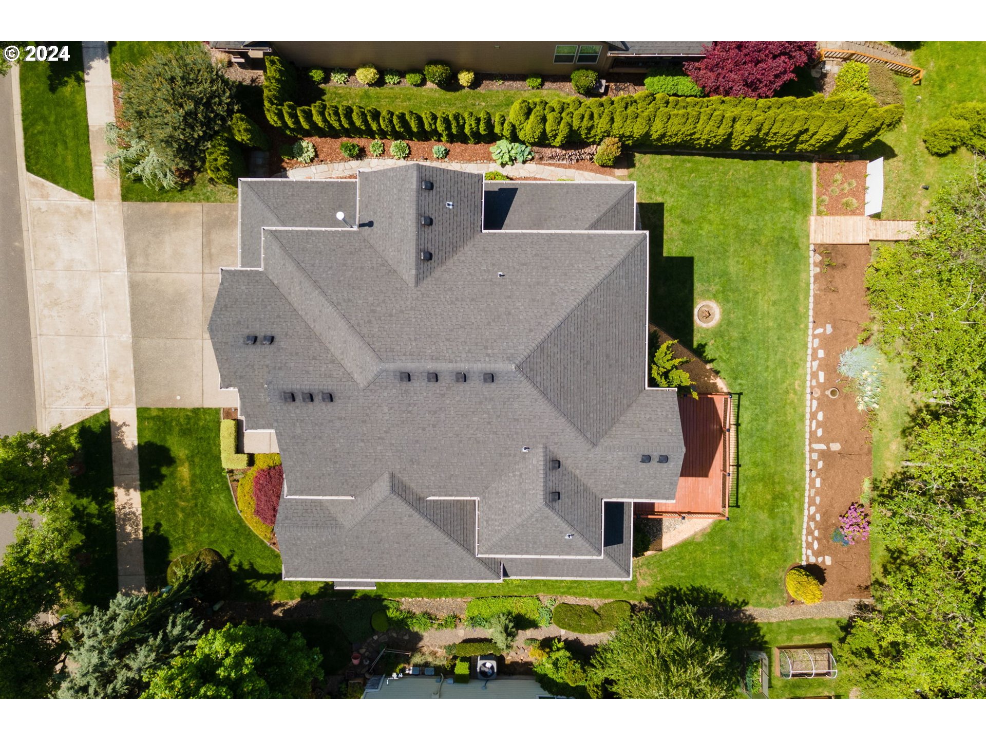 2204 South 17th Way Ridgefield, WA 98642 - Photo 31 of 45 an aerial view of a house with a yard swimming pool outdoor seating and entertaining space