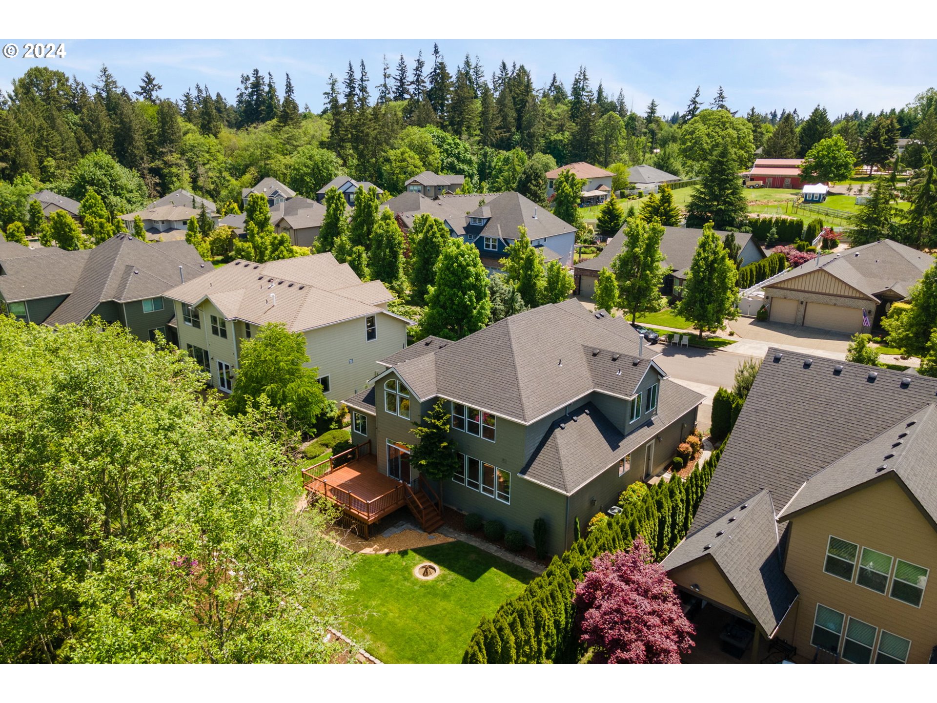 2204 South 17th Way Ridgefield, WA 98642 - Photo 34 of 45 an aerial view of a house with garden space and lake view
