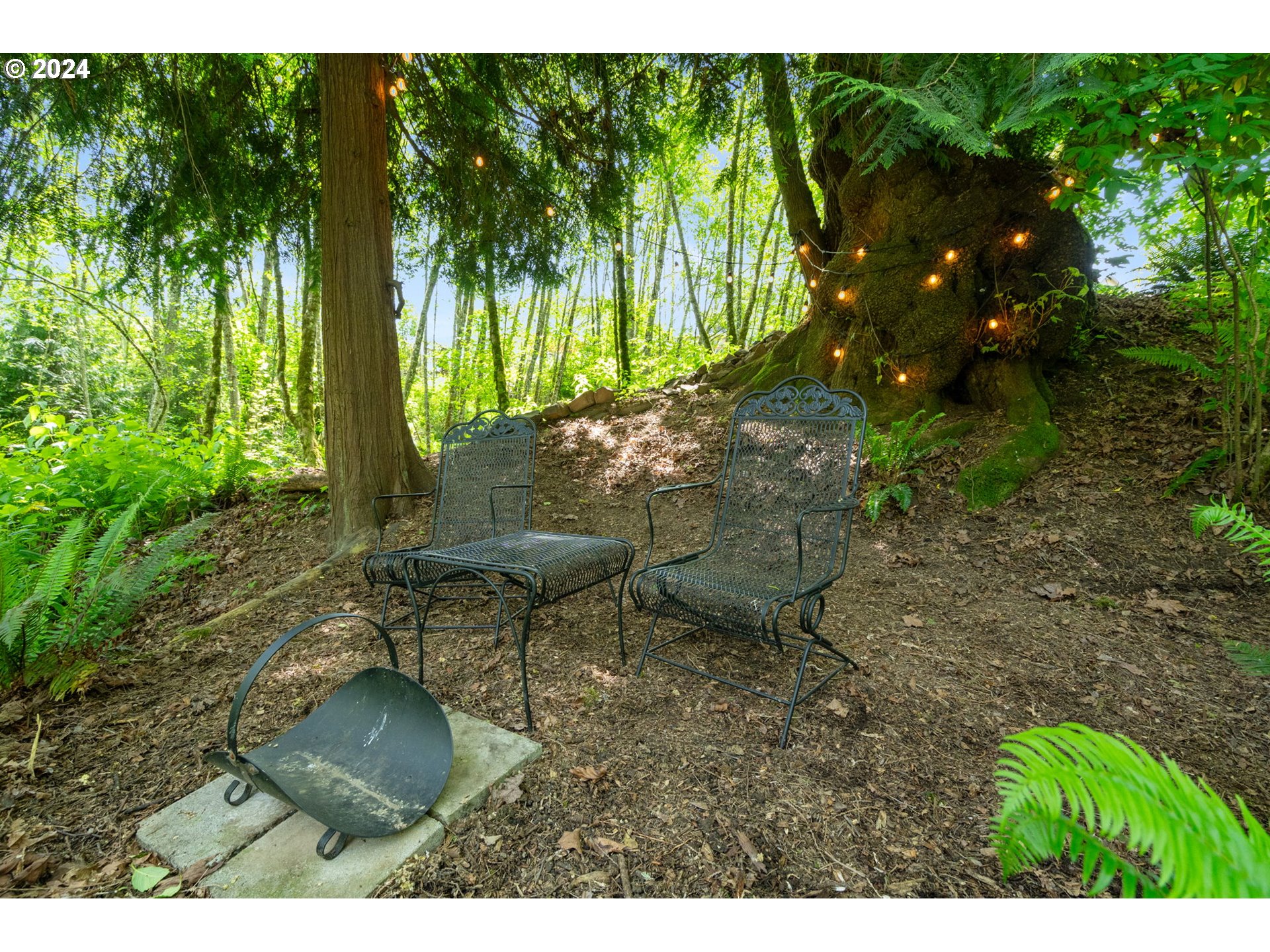 2204 South 17th Way Ridgefield, WA 98642 - Photo 39 of 45 a backyard of a house with table and chairs