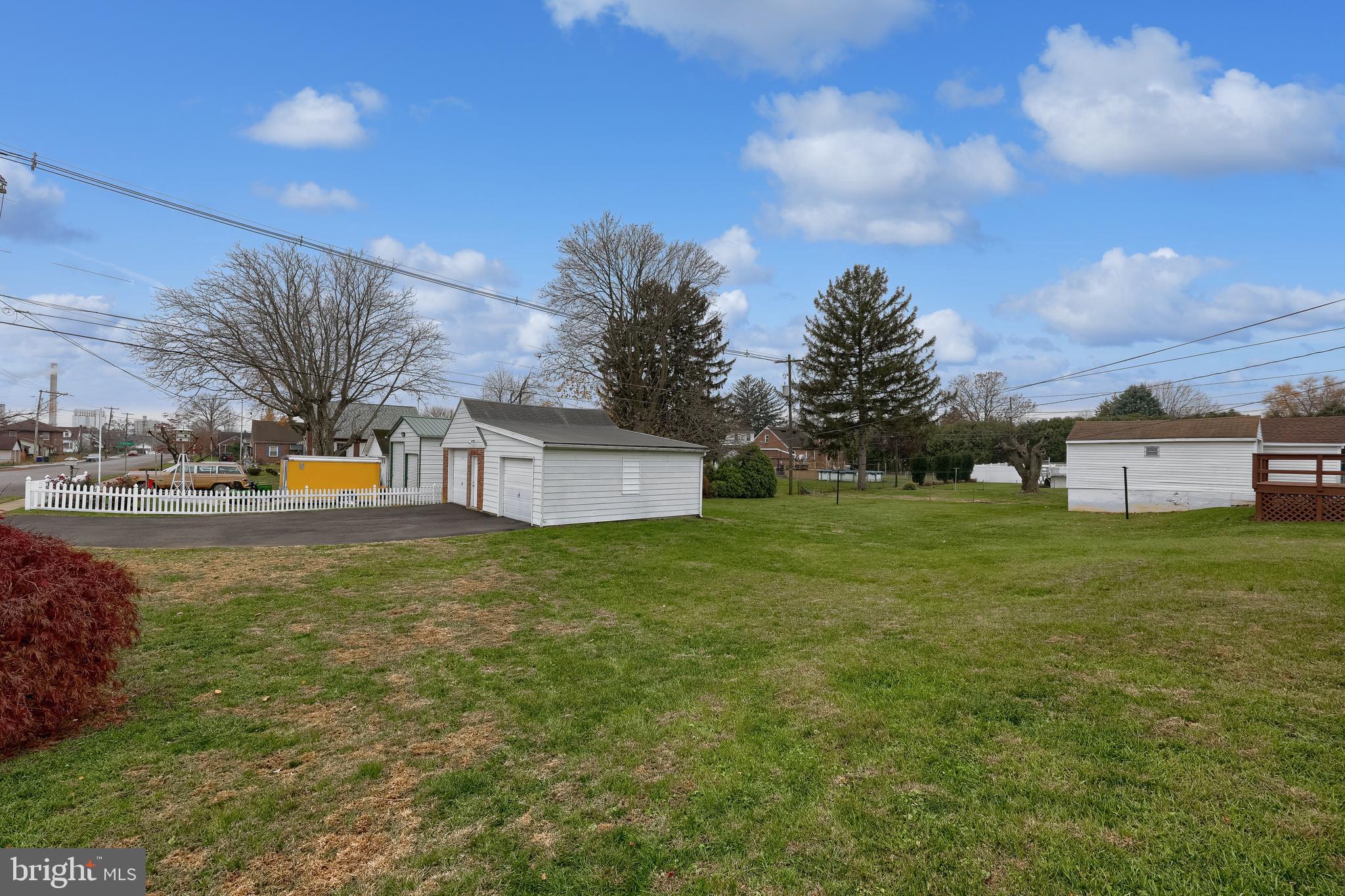 2000 Filbert Street York, PA 17404 - Photo 38 of 41 a tall yellow building with trees in the background