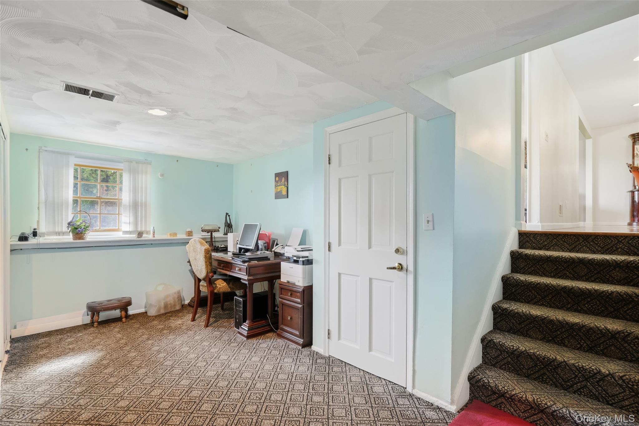 623 Cardinal Road Cortlandt Manor, NY 10567 - Photo 26 of 40 a view of a livingroom with furniture and staircase