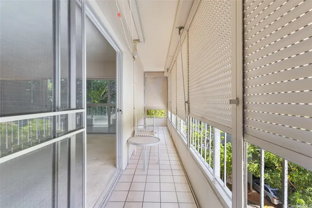 a view of bathroom with a sink toilet and mirror