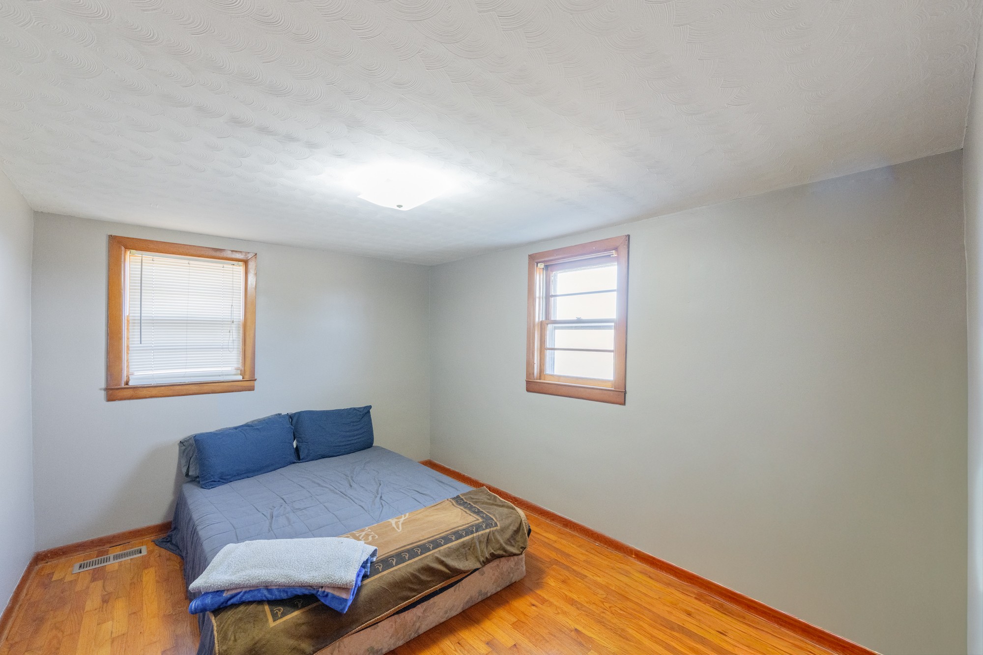 2095 Bible Hill Road Parsons, TN 38363 - Photo 19 of 20 a bedroom with a bed and window