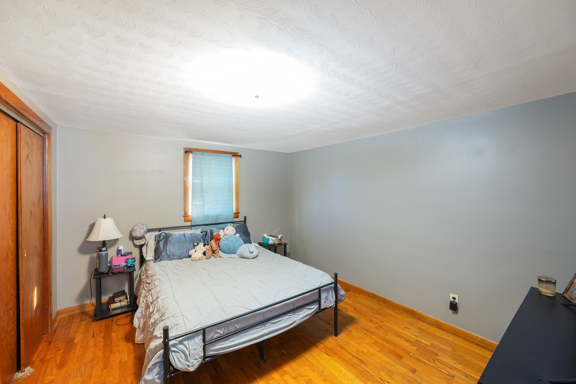 2095 Bible Hill Road Parsons, TN 38363 - Photo 20 of 20 a bedroom with a bed and wooden floor