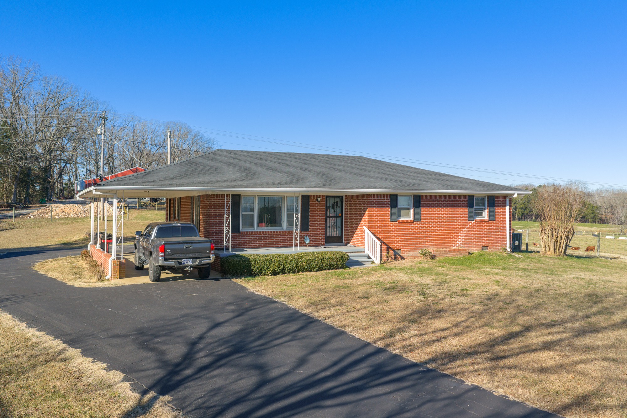 2095 Bible Hill Road Parsons, TN 38363 - Photo 2 of 20 a view of a house with outdoor space and sitting area