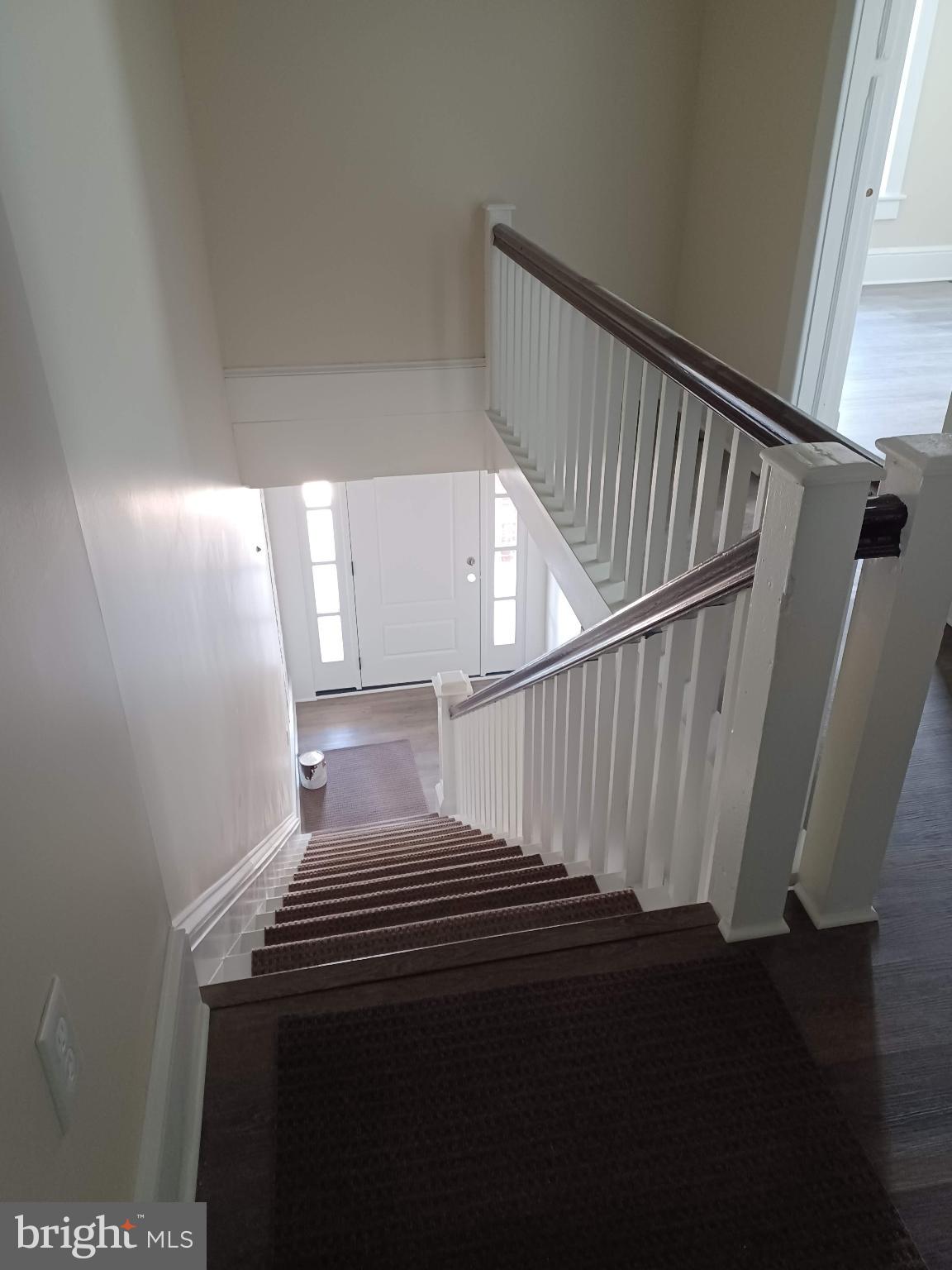302 North Kent Street Winchester, VA 22601 - Photo 2 of 11 a view of entryway and hall with wooden floor